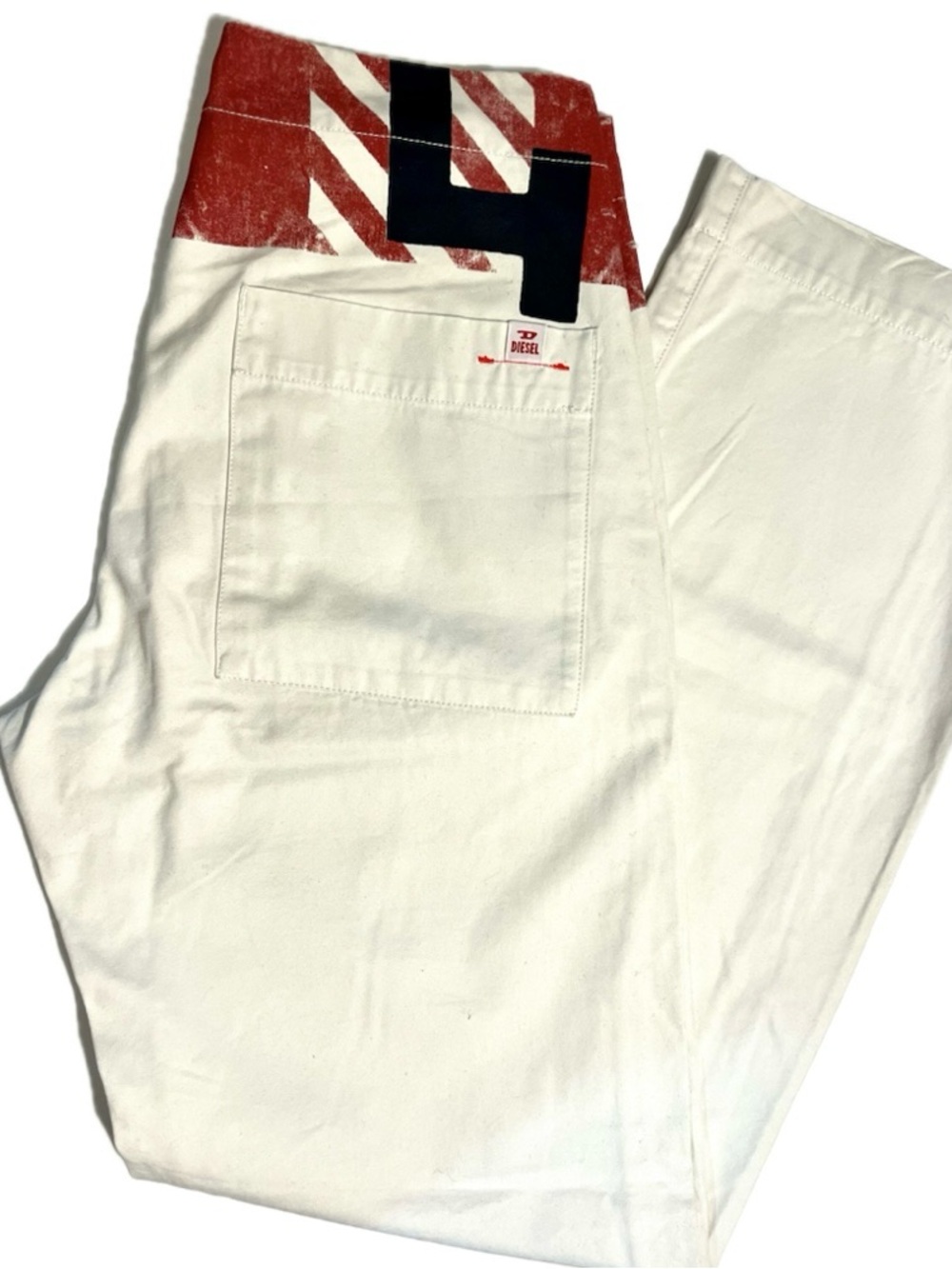 Diesel off white with red and black print jeans Size 30 price $90